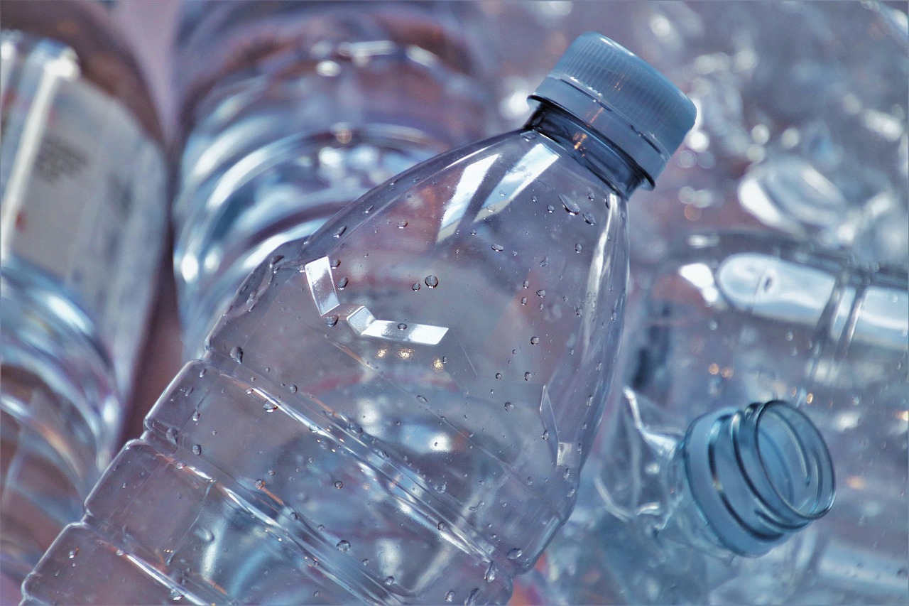 Empty plastic bottles highlighting sustainability and recycling challenges addressed by CSRD compliance.