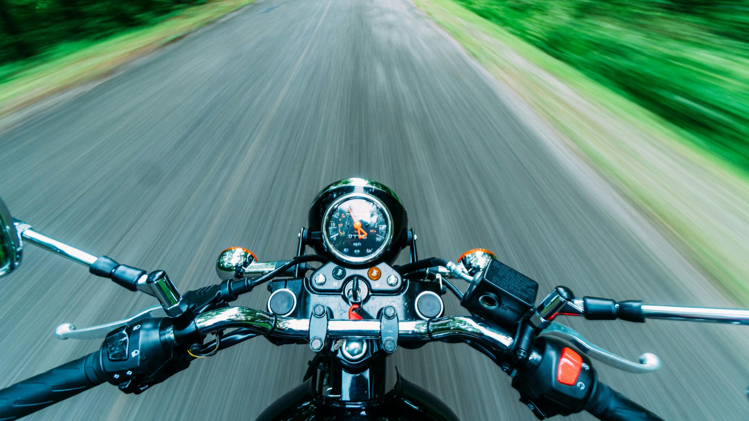 A bike running on an open road, symbolizing agility and speed.